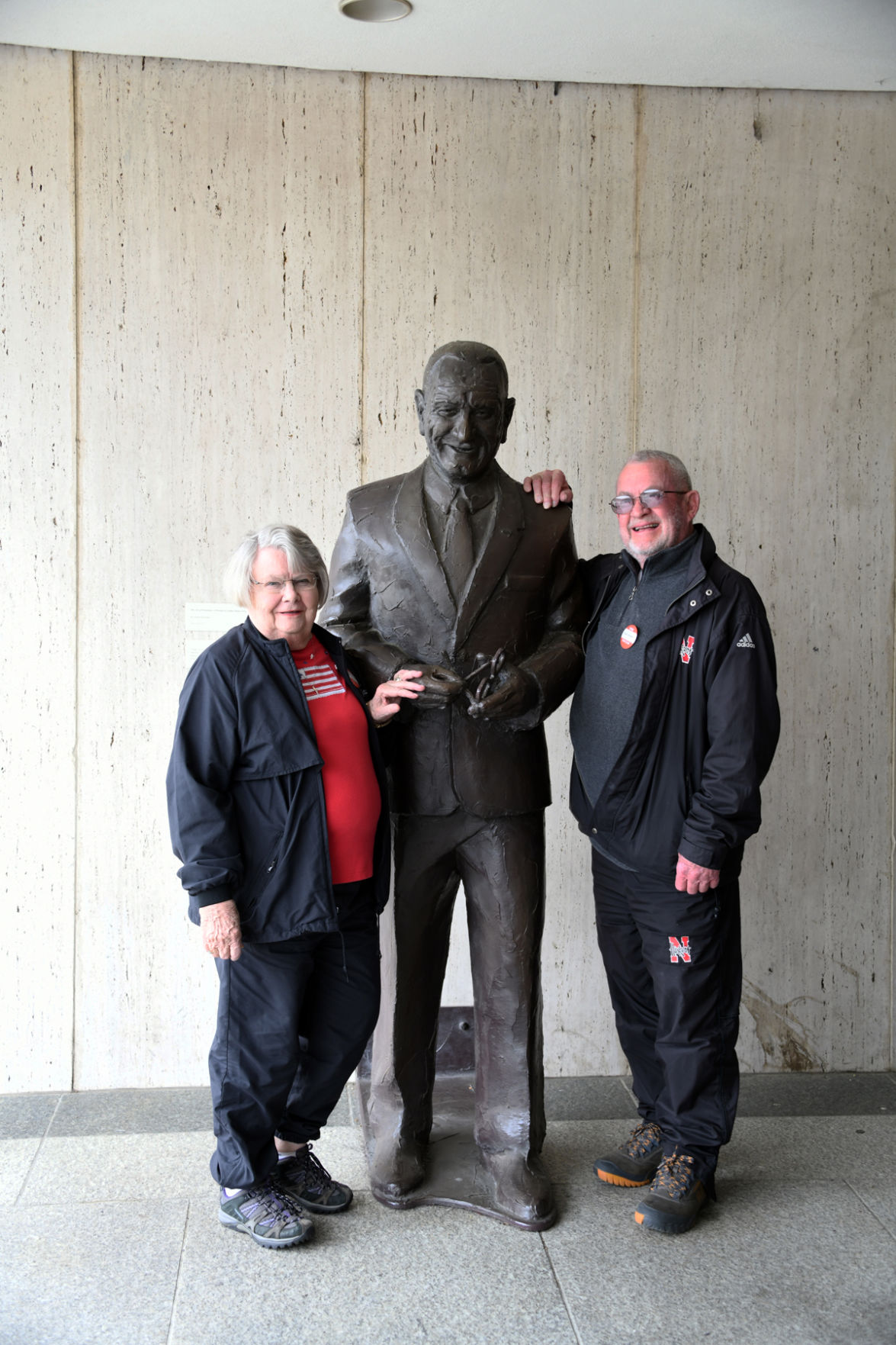 073 Sue and Dick Hodge pose with life-size bronze statue of LBJ outside of his library in Austin.JPG